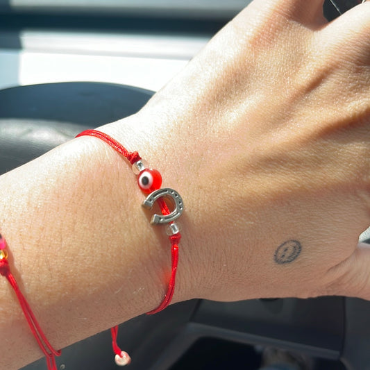 Evil eye/Horse Shoe string Bracelet