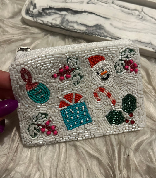 White beaded Christmas pouch.