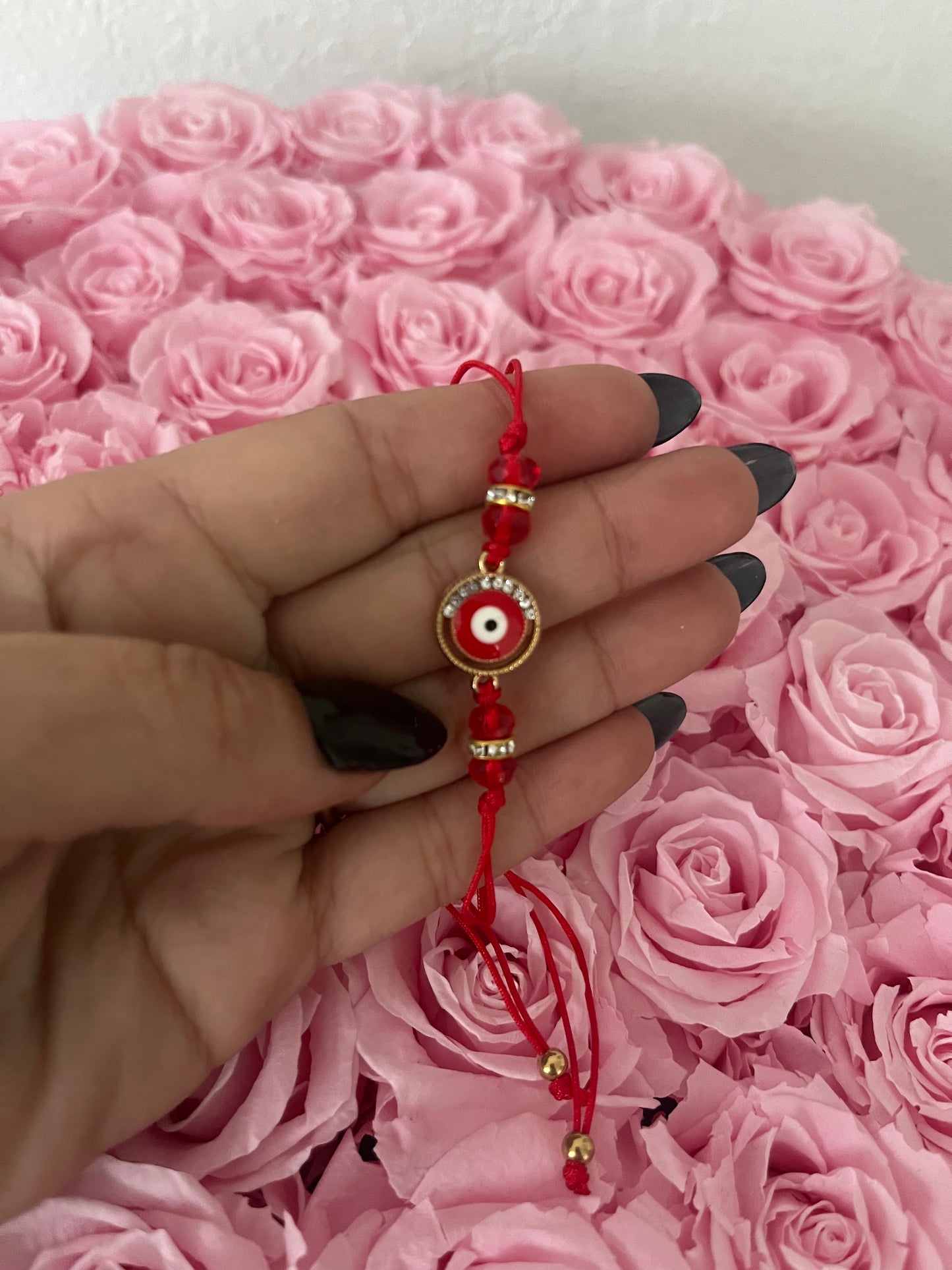 Round Red Evil Eye string bracelet