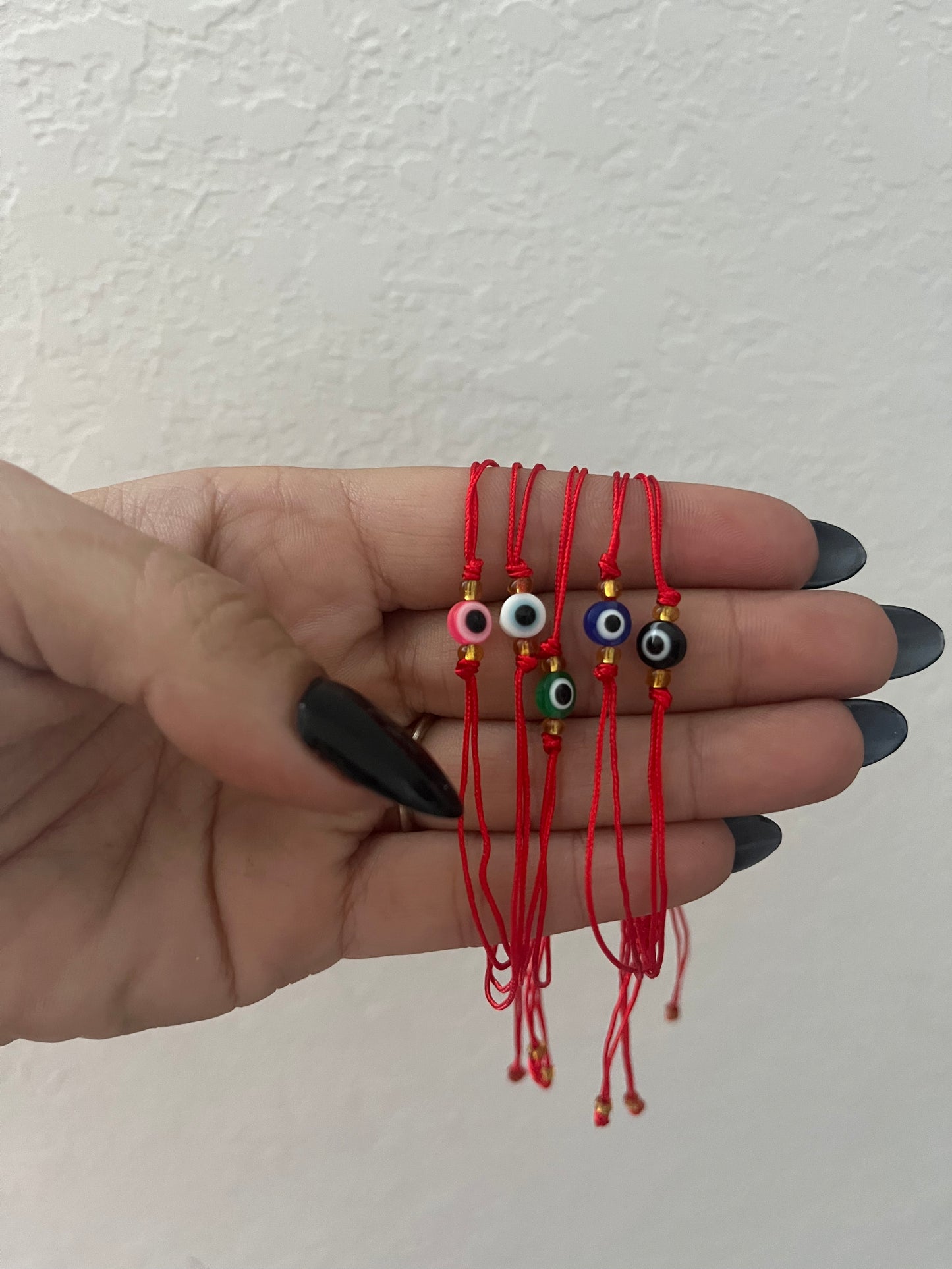 Evil eye string bracelets