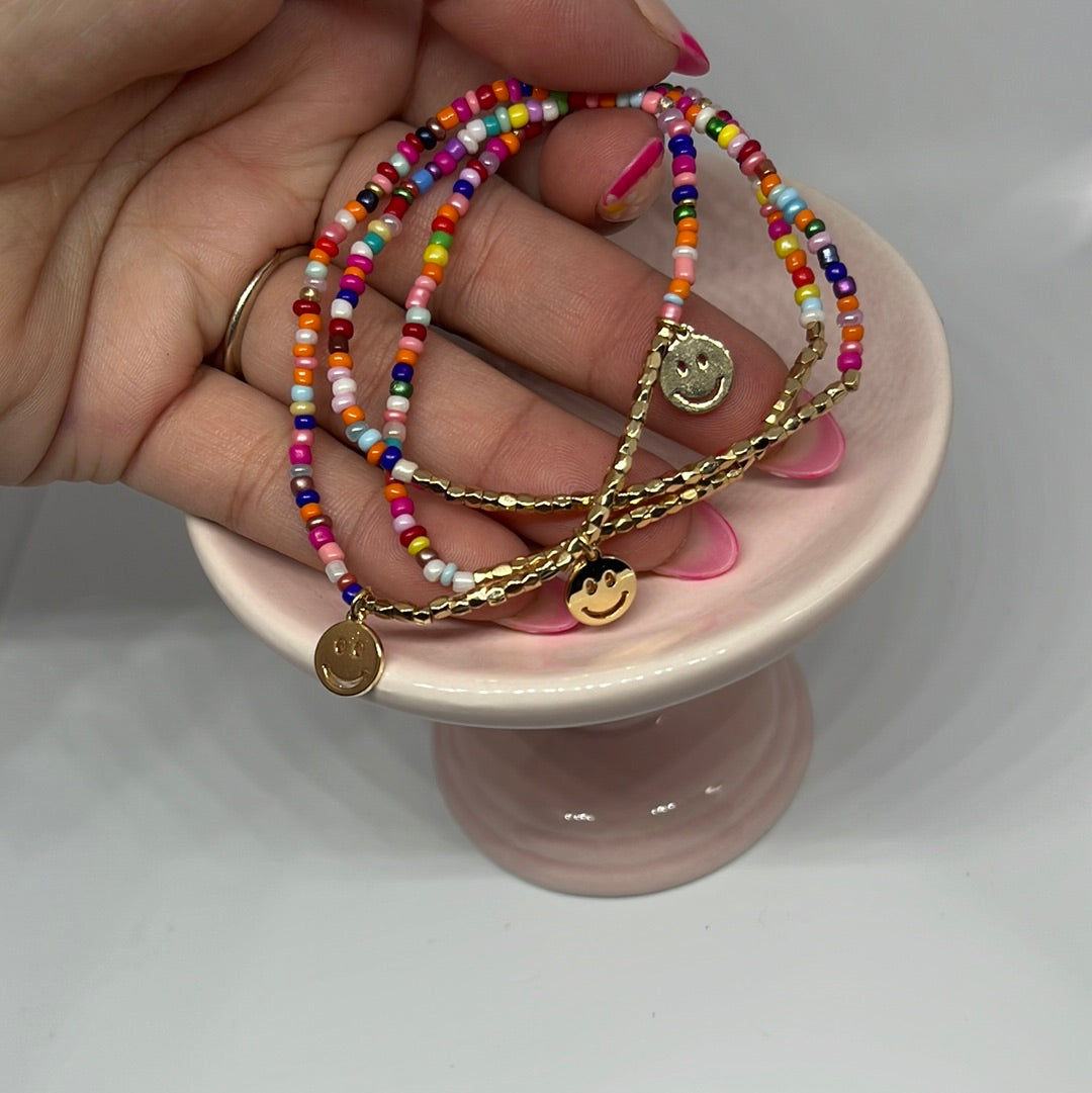 Colorful beaded bracelets with smiley face