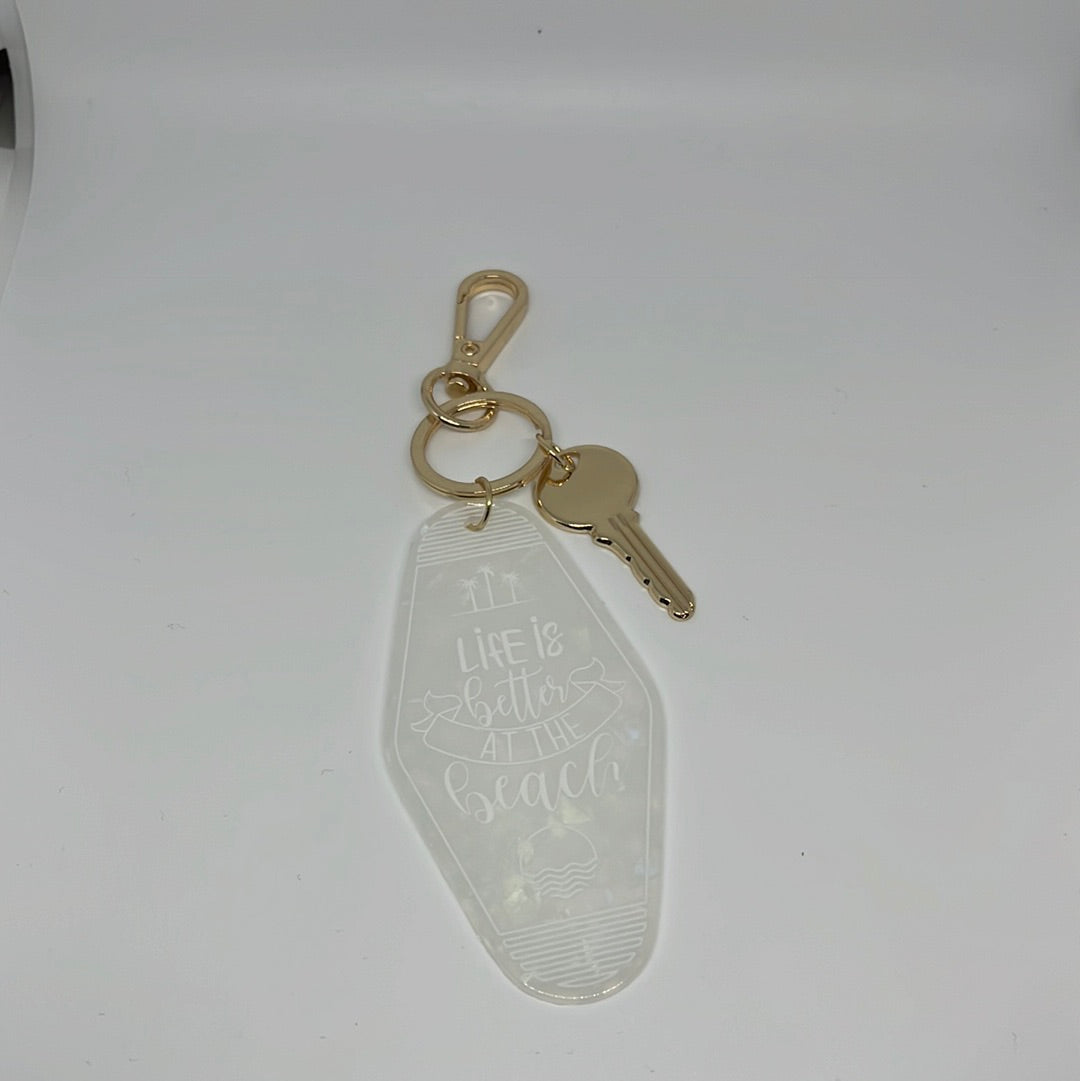 White beach hotel keychain