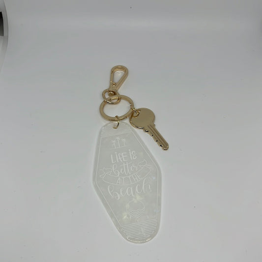 White beach hotel keychain