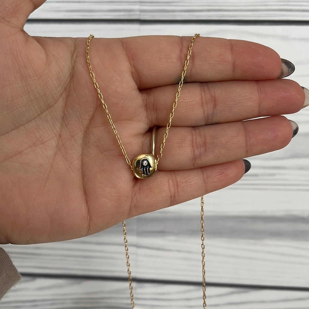 Gold Necklace with Black Hamsa Hand